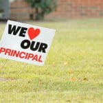 We love our principal sign in front of school